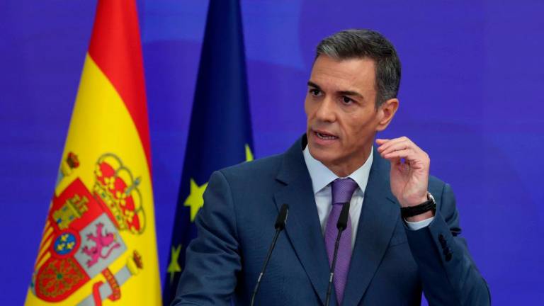 Spain’s Prime Minister Pedro Sanchez gestures as he speaks during a biannual press conference at La Moncloa Palace in Madrid on July 28, 2025. (Photo by Pierre-Philippe MARCOU / AFP)