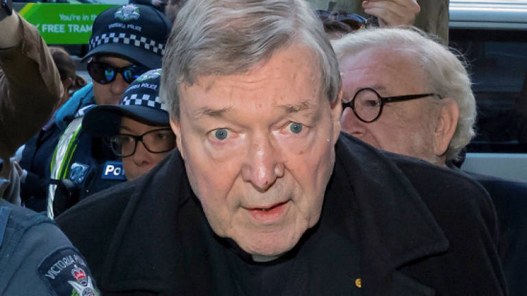 Cardinal Pell denies abuse charges in Australian court (Updated)