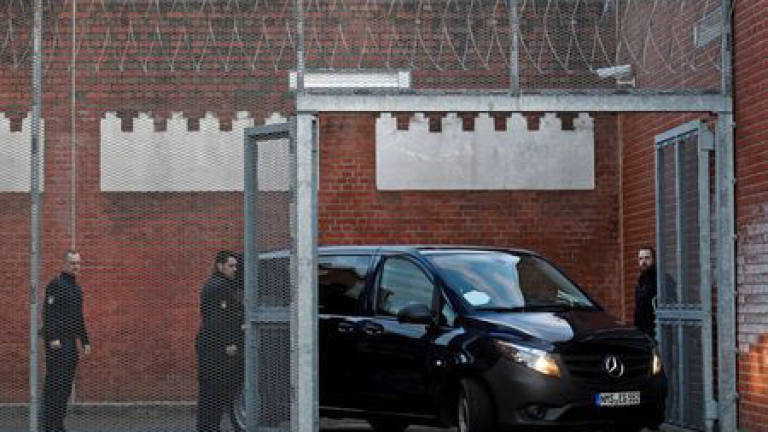 German court keeps ex-Catalan leader Puigdemont in custody