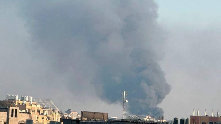 Smoke rises during Israeli strikes amid the Israeli military operation in Deir Al-Balah, in the central Gaza Strip - Reuterspix