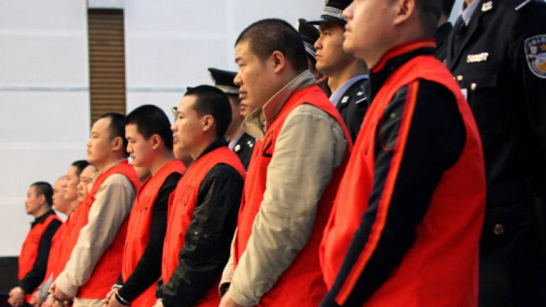 China sets death penalty threshold in graft cases
