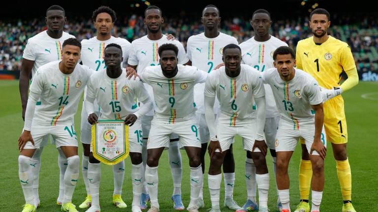 Senegal players pose for a team group photo before the match REUTERS