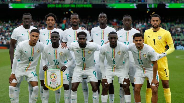 Senegal players pose for a team group photo before the match REUTERS
