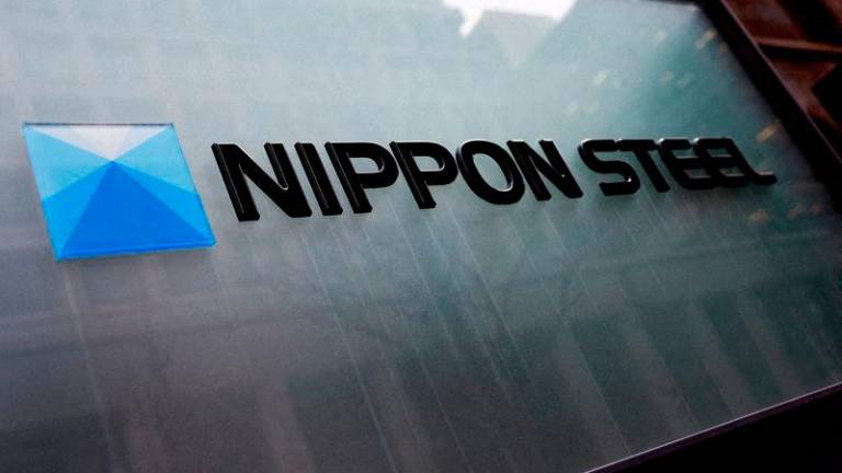 Nippon Steel logo is displayed at the company’s headquarters in Tokyo - REUTERSpix