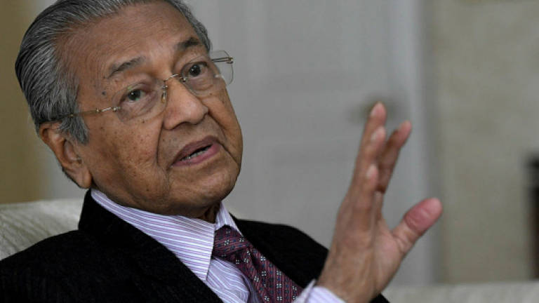 Mahathir arrives in Bangkok for two-day Thailand visit