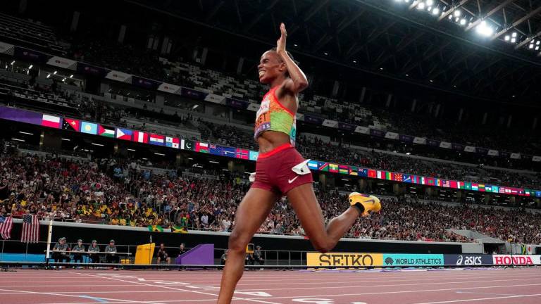 World Athletics Championships Tokyo 2025 - Women's 5000m Final - Japan National Stadium, Tokyo, Japan - September 20, 2025Kenya's Beatrice Chebet crosses the finish line to win the final - REUTERSPIX