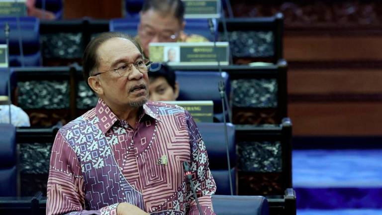 Prime Minister Datuk Seri Anwar Ibrahim during the Ministers’ Question Time session at the Second Meeting of the Fourth Session of the 15th Parliament in the Dewan Rakyat at the Parliament building today. – BERNAMA