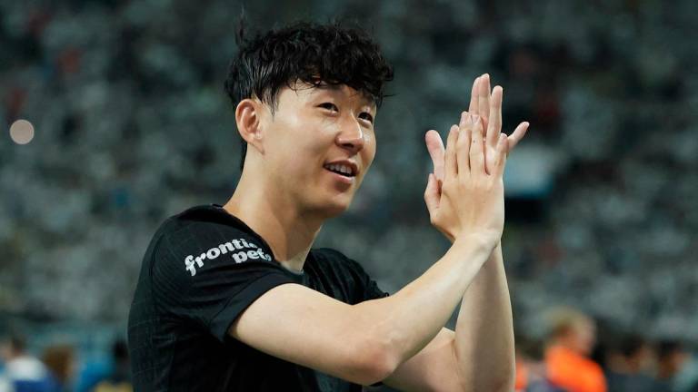 Son Heung-Min embraces Lucas Bergvall after playing his last game for Tottenham Hotspur. - REUTERS/Kim Soo-Hyeon