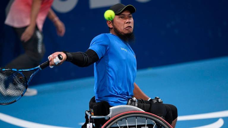Jaguh tenis kerusi roda negara Abu Samah Borhan. - fotoBERNAMA