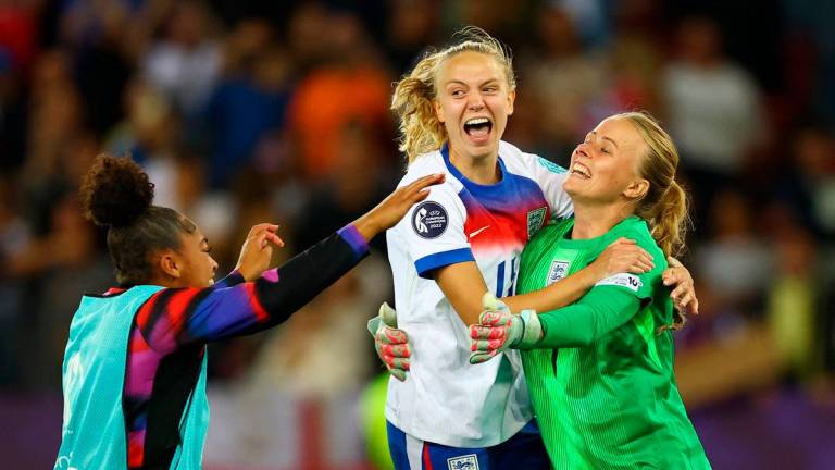 England’s Khiara Keating, England’s Esme Morgan and England’s Hannah Hampton celebrate winning the penalty shootout REUTERS