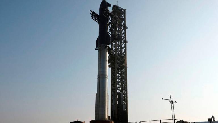 SpaceX’s Super Heavy booster is seen on the launch pad, with Starship atop as it is prepared for its ninth mission targeted for May 27 from the company’s Starbase launchpad on an uncrewed test flight, in Starbase, Texas, U.S. May 26, 2025. REUTERSpix
