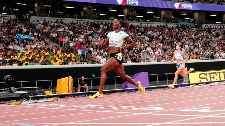 World Athletics Championships Tokyo 2025 - Women's 100m Round 1 - Japan National Stadium, Tokyo, Japan - September 13, 2025Saint Lucia's Julien Alfred crosses the line to win heat 4 - REUTERSPIX
