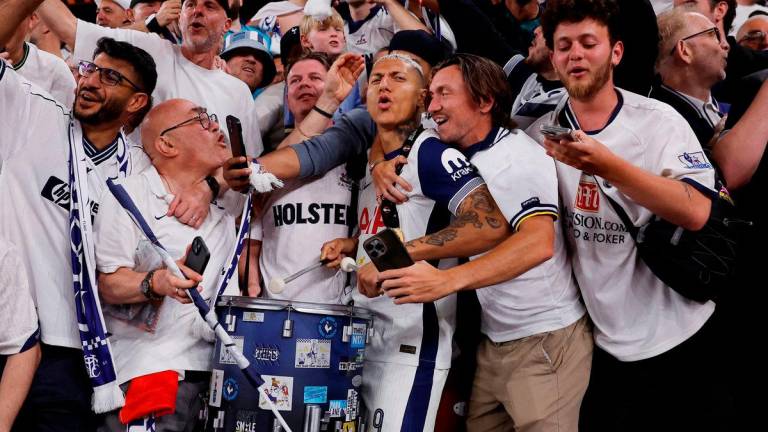 Tottenham Hotspur’s Richarlison celebrates with fans after winning the Europa League Final REUTERSpix
