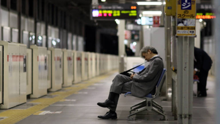 Working to death in Japan: health warning over 'no overtime' law