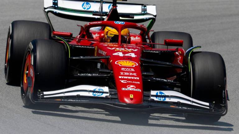 Hamilton determined to make Ferrari adventure work