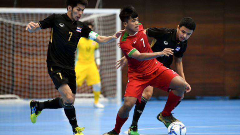 Indonesia cause sensational upset by beating defending champion Thailand