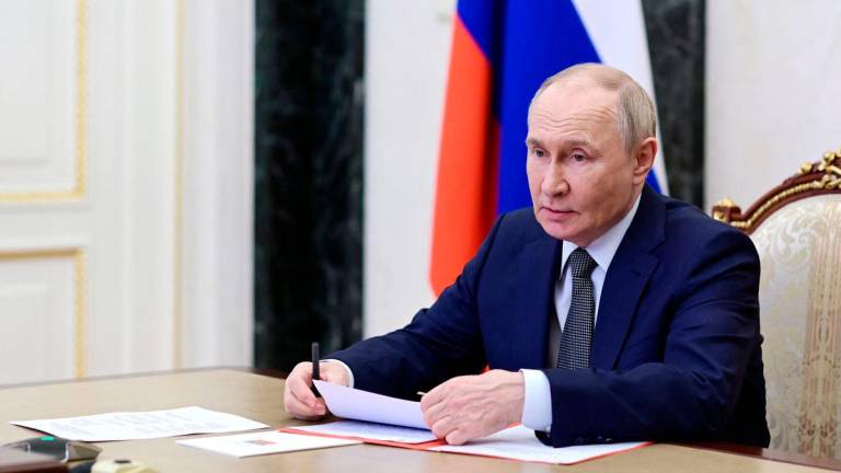 Russian President Vladimir Putin chairs a meeting with members of the Security Council via a video link in Moscow, Russia, May 16, 2025. REUTERSpix