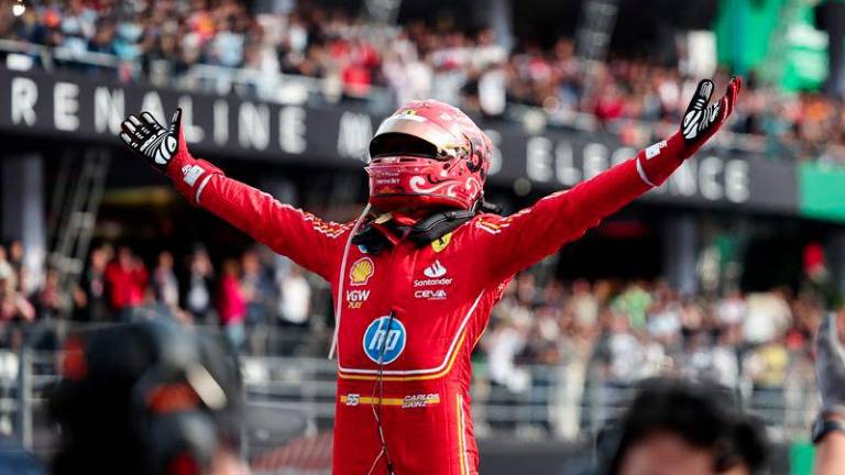 Formula One F1 - Mexico City Grand Prix - Autodromo Hermanos Rodriguez, Mexico City, Mexico - October 27, 2024Ferrari's Carlos Sainz Jr. celebrates winning Mexico City Grand Prix - REUTERSPIX