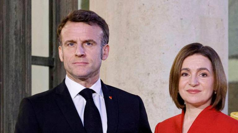 France’s President Emmanuel Macron and Moldova’s President Maia Sandu - AFPpix