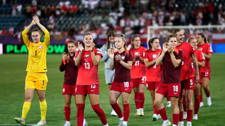 Poland’s Emilia Szymczak with teammates celebrate after the match REUTERS/Stephane Mahe