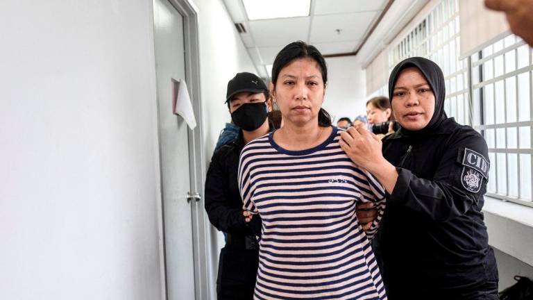 Nurshazwani Afni Mohamad Zorki, 41, the woman who attempted to attack the Sultan of Perak, Sultan Nazrin Shah, during the recent state-level National Day celebration, was today charged at the Magistrates’ Court here with committing criminal force against His Royal Highness. – BERNAMA