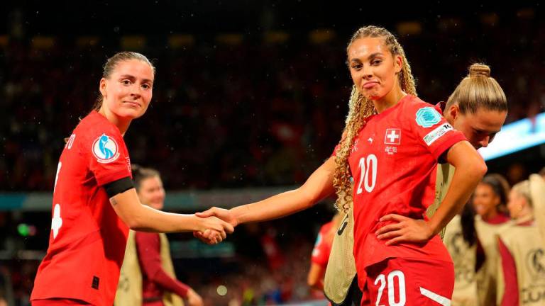 Switzerland’s Alayah Pilgrim celebrates scoring their second goal with Smilla Vallotto REUTERS
