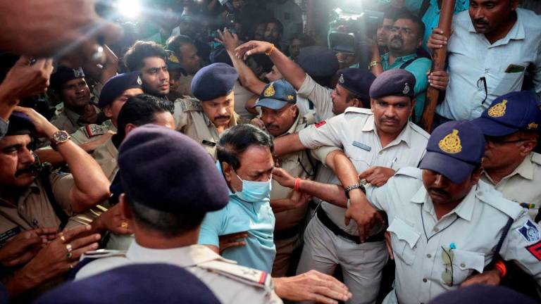 Sresan Pharma owner, S. Ranganathan, is escorted by Police to a local court after one of their medicines, Coldrif cough syrup, was linked to the death of multiple children in Parasia, Madhya Pradesh, India, October, 10, 2025. - REUTERS