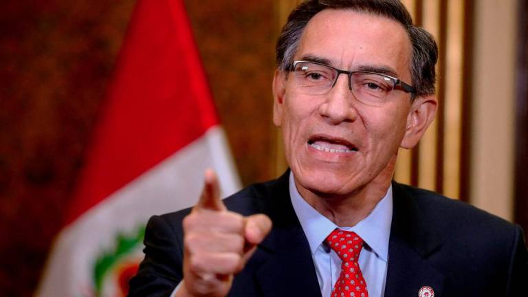 Handout picture released by the Peruvian presidency of President Martín Vizcarra speaking during a televised announcement to the Nation on July 5, 2020, in Lima, to announce he will call for a referendum in 2021 to decide on the elimination of parliamentary immunity. - (Photo by Andrés Valle/Peruvian Presidency/AFPPIX