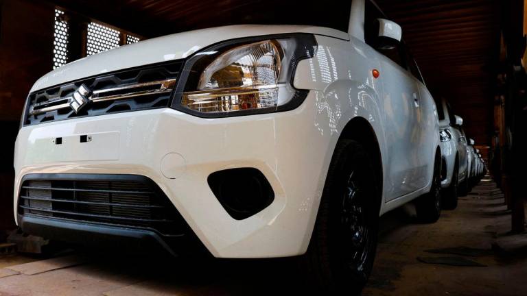 FILE PHOTO: Maruti Suzuki Wagon R are parked inside a train at Maruti Suzuki’s plant in Manesar, Haryana, India, June 17, 2025. REUTERS/Bhawika Chhabra/File Photo