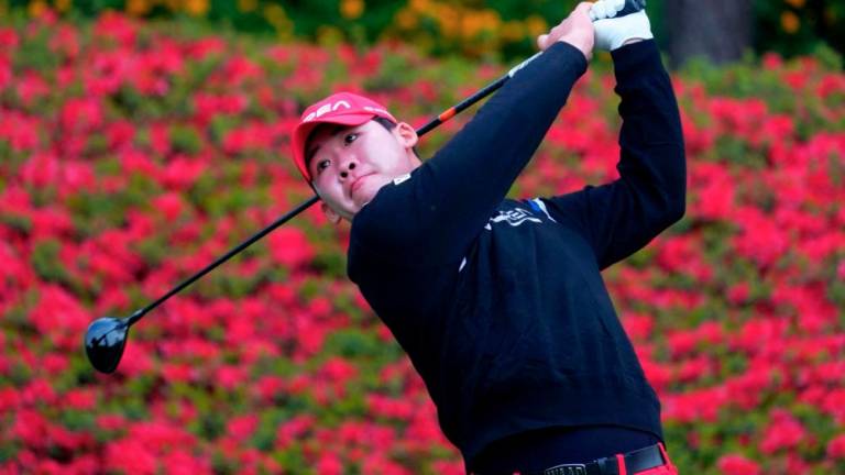 Fifteen-year-old amateur star An Seonghyeon An hits a shot at the GS Caltex Maekyung Open. – Asian Tour