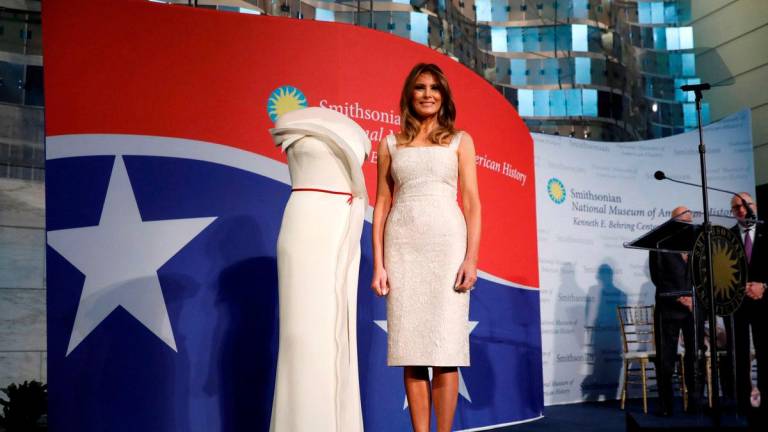 FILE PHOTO: U.S. first lady Melania Trump presents her inaugural gown to the Smithsonian’s National Museum of American History in Washington, U.S., October 20, 2017 - REUTERS
