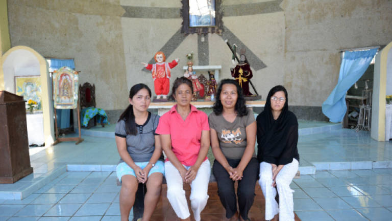Philippine Catholics make lifelong sacrifice after typhoon