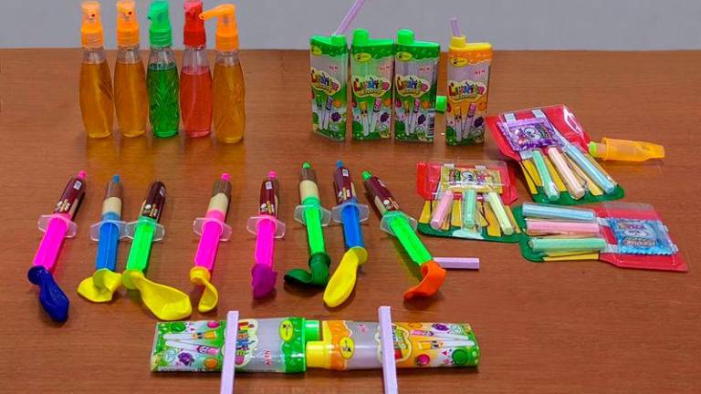 The growing availability of vape-like and syringe-shaped candies targeted at children has sparked serious concerns among consumer advocates and experts. - MASRY CHE ANI THESUN