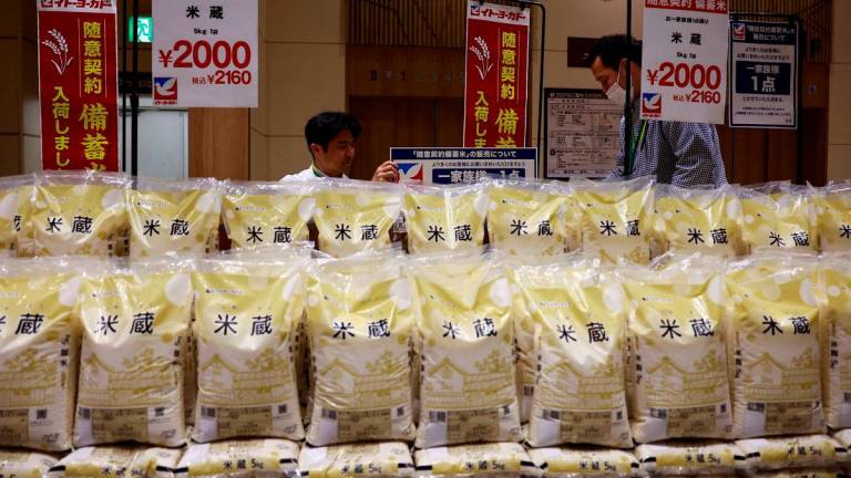 FILE PHOTO: Government-stockpiled rice aiming at resolving persisting price rises displayed at Ito-Yokado grocery store, a subsidiary of Seven &amp; i Holdings, in Tokyo, Japan May 31, 2025. REUTERS/Issei Kato/File Photo