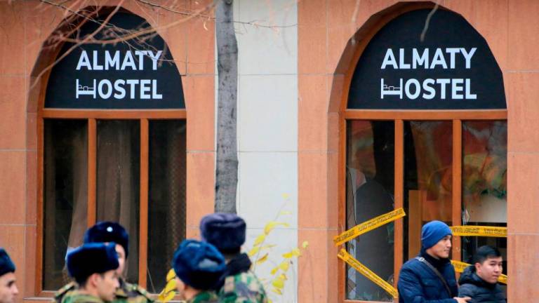 A view of the site of a hostel fire in Almaty on November 30, 2023/AFPPix
