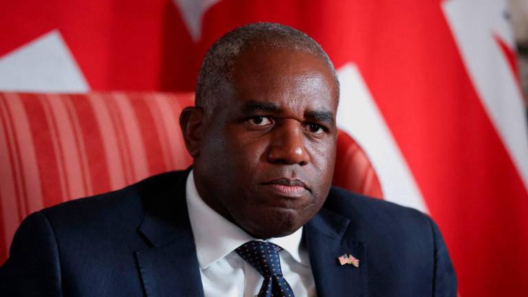 British Foreign Secretary David Lammy looks on as he meets with U.S. Vice President JD Vance (not pictured) at Chevening House in Sevenoaks, Britain, August 8, 2025. Suzanne Plunkett/Pool/ REUTERS