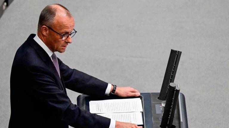 German Chancellor Friedrich Merz addresses delegates at the Bundestag (lower house of parliament) on June 24, 2025 in Berlin, prior on the upcoming NATO and EU summits. (Photo by John MACDOUGALL / AFP)