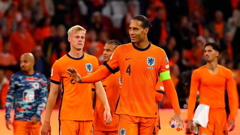 Netherlands’ Virgil van Dijk celebrates after the match. - REUTERS/Piroschka Van De Wouw