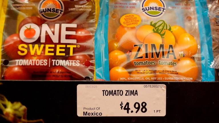 Tomatoes from Mexico are displayed on a grocery store shelf. Credit: Justin Sullivan/Getty Images/AFP