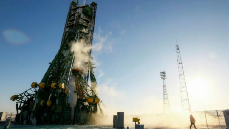 Two rookie astronauts, cosmonaut blast off to ISS (Updated)