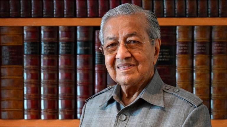 This picture taken on May 5, 2025 shows Malaysia’s former prime minister Mahathir Mohamad posing for a picture at his office in Putrajaya. AFPpix