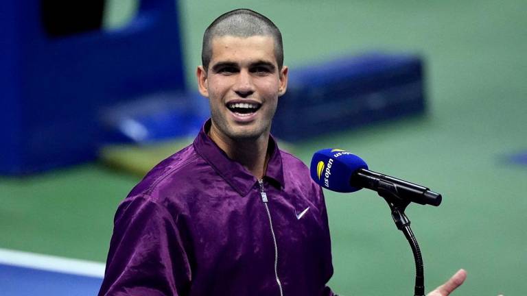 Spain’s Carlos Alcaraz speaks after winning his first round match against Reilly Opelka of the U.S. - REUTERS/Eduardo Munoz