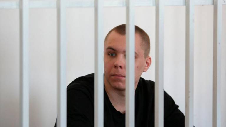 Defendant Nikita Zhuravel, who was detained in May 2023 under a law against offending religious believers’ feelings after he burned a copy of the Koran outside a mosque in Volgograd city, attends a court hearing in the Chechen capital of Grozny, Russia/REUTERSPix