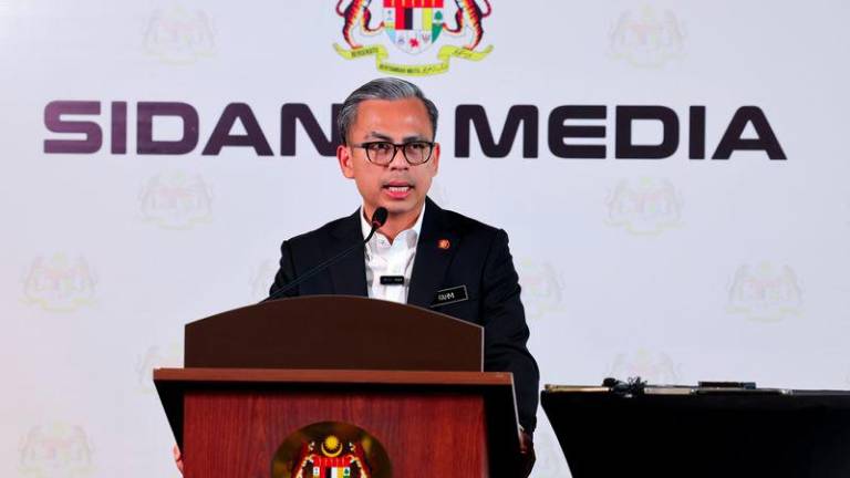 Communicaations Minister cum Unity Government spokesperson Fahmi Fadzil holds a media conference after post cabinet meeting at his ministry - BERNAMAPIX