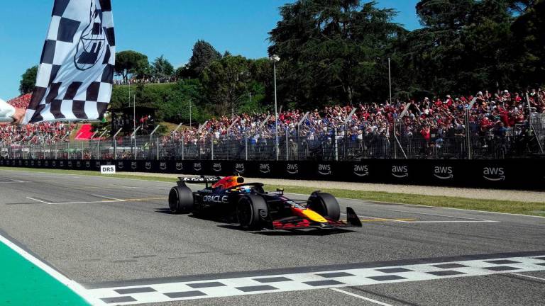Formula One F1 - Emilia Romagna Grand Prix - Autodromo Enzo e Dino Ferrari, Imola, Italy - May 18, 2025Red Bull's Max Verstappen passes the chequered flag to win the Emilia Romagna Grand Prix Pool - REUTERSPIX