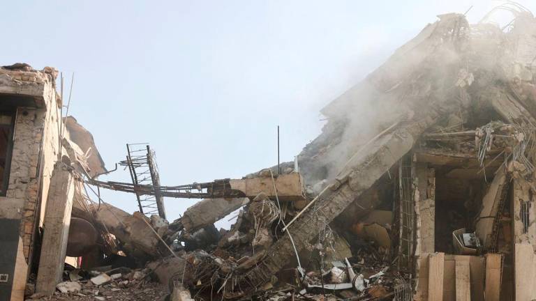 Smoke rises from a damaged building in the aftermath of Israeli strikes, in Tehran, Iran, June 13, 2025. - REUTERSPIX