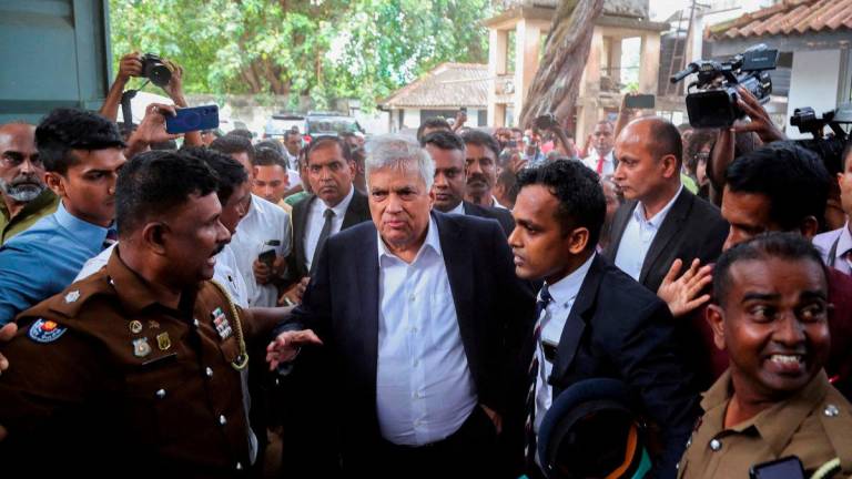 Sri Lanka’s former President Ranil Wickremesinghe arrives at the Magistrate’s Court in Colombo, Sri Lanka, August 22, 2025. REUTERS/Lahiru Harshana TPX IMAGES OF THE DAY