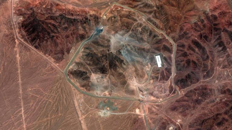 This handout satellite picture provided by Maxar Technologies and taken on June 24, 2025, shows craters along the access roads that lead to the tunnel entrances on Iran’s Fordow Fuel Enrichment Plant (FFEP), northeast of the city of Qom. - AFP PHOTO/ SATELLITE IMAGE ©2025 MAXAR TECHNOLOGIES