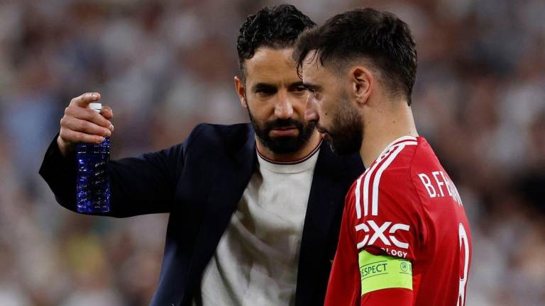 Manchester United manager Ruben Amorim with Manchester United’s Bruno Fernandes after the match REUTERSpix