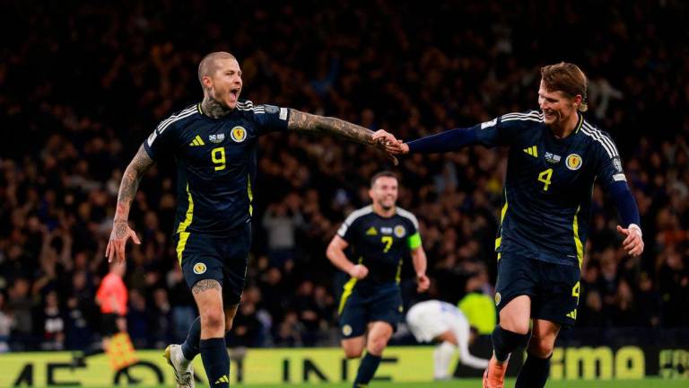 Scotland’s Lyndon Dykes celebrates scoring their third goal Action Images via Reuters/Lee Smith TPX IMAGES OF THE DAY